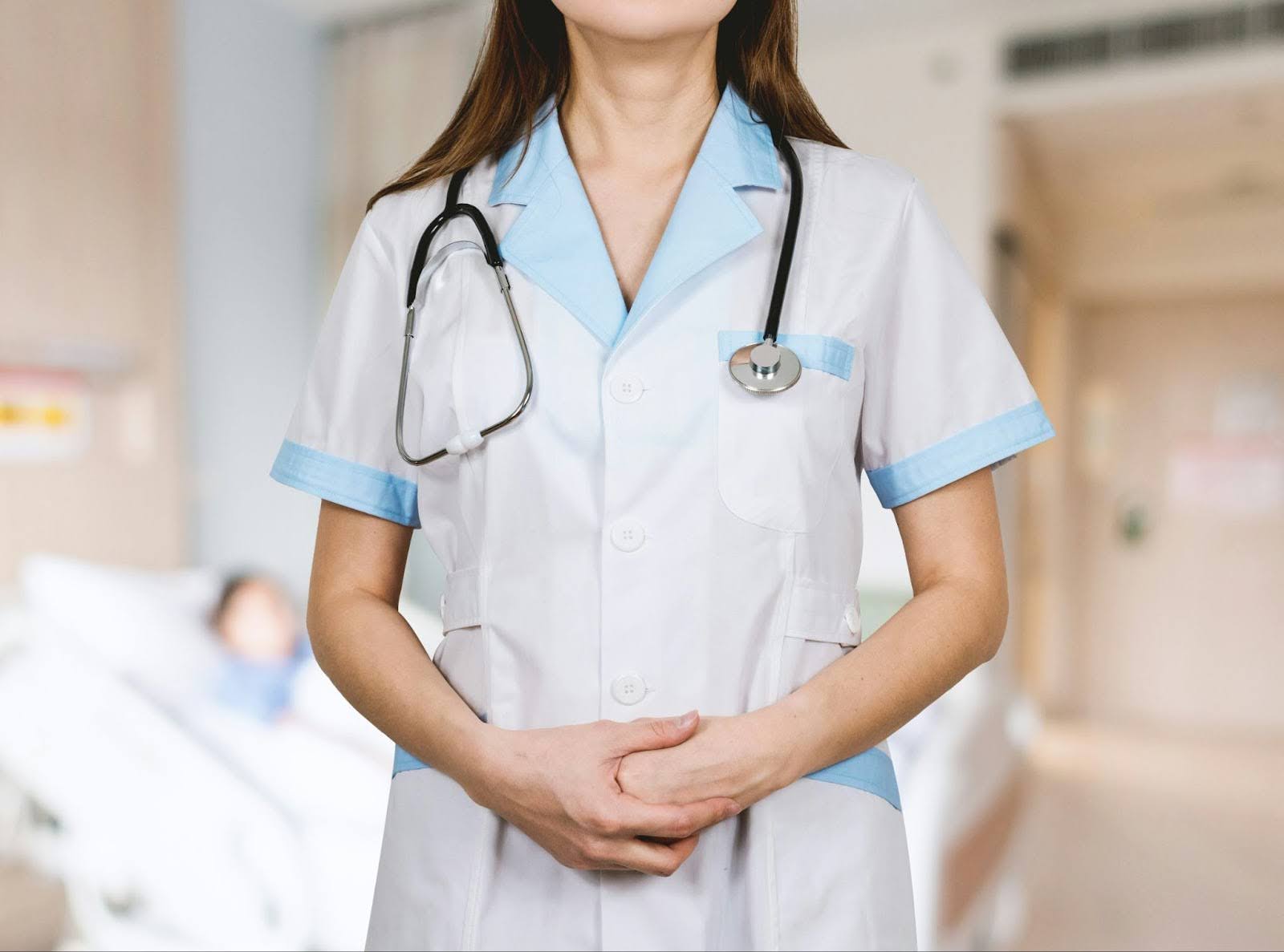 A new nurse in her uniform.