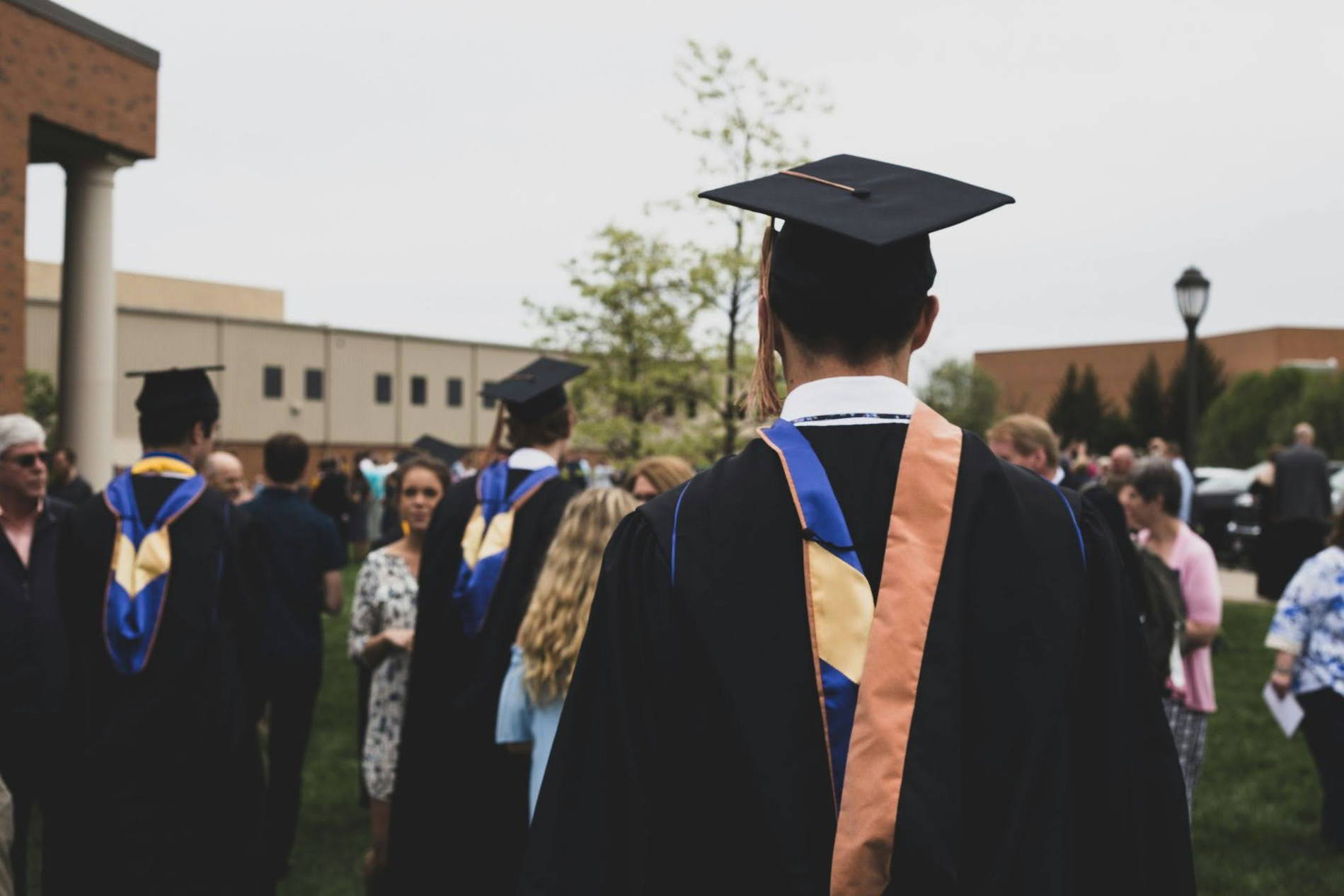 People getting their master’s degree.
