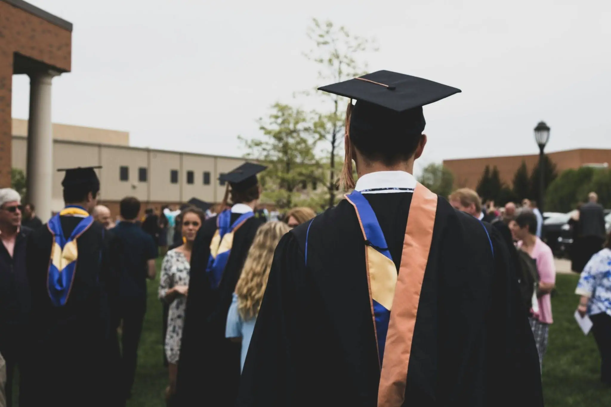 People getting their master’s degree.